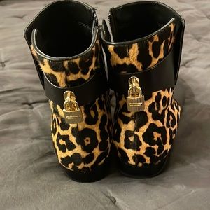 Michael Kors booties, gold lock, SZ 7 1/2. Animal print fur on back. Excellent!